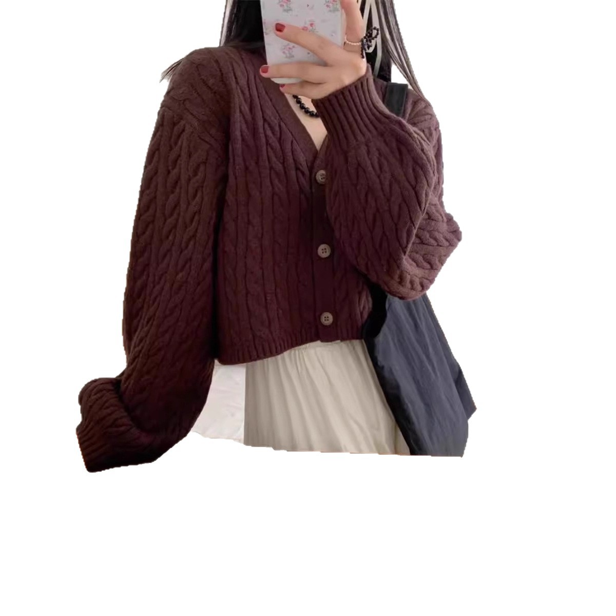Corea del Sur Dongdaemun simple torcido corto de cintura alta jersey cardigan de punto para mujeres otoño y invierno nuevo suéter de manga de linterna pequeña