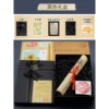 A big newspaper + black gift box (black grass)