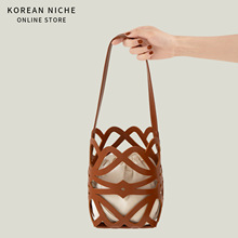 新款韩版小众镂空设计菜篮子包水桶型个性时髦百搭手提单肩包女