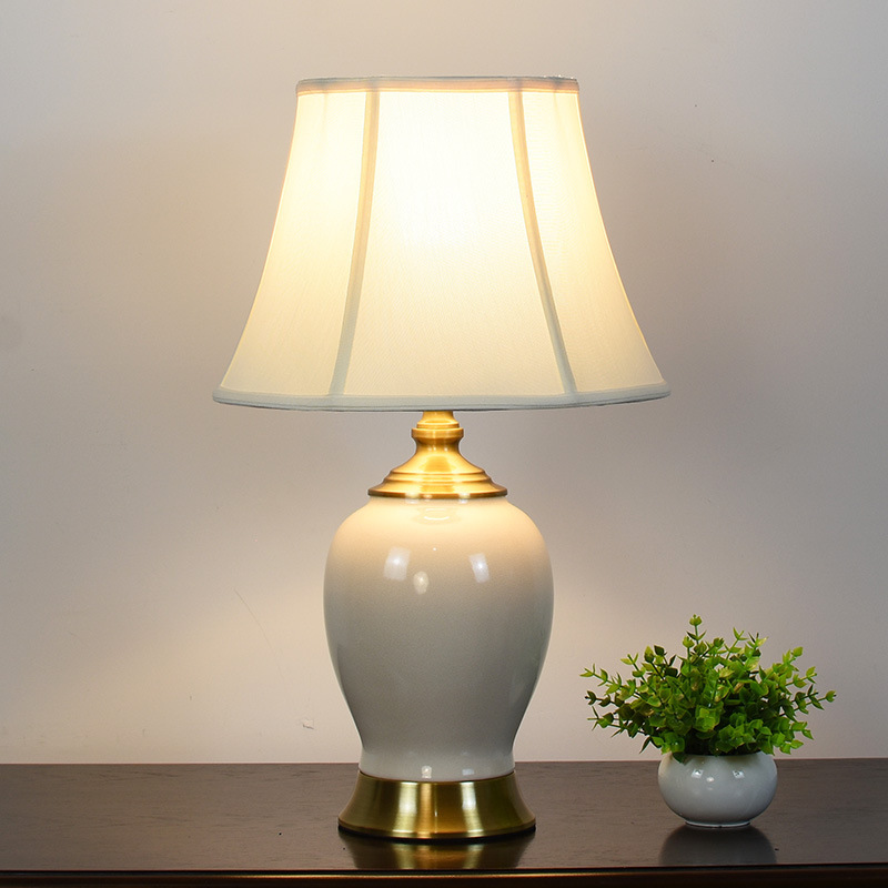 Light luxury American country table lamp bedroom bedside table lamp warm fabric ceramic table lamp led table lamp a generation of hair