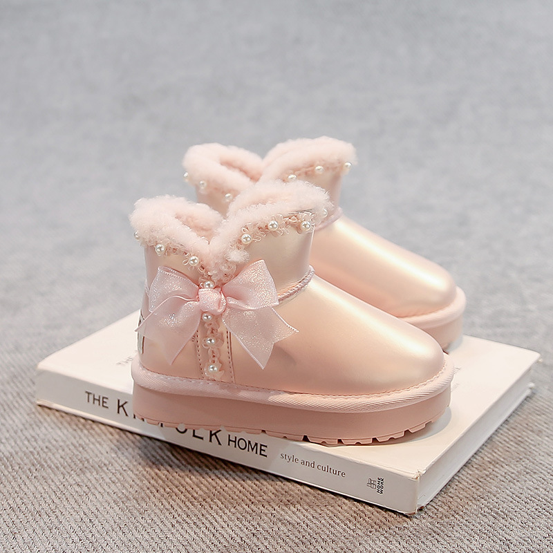 Zapatos de algodón princesa de arco de niñas para niños botas de nieve de lana de invierno 2025 nuevas niñas zapatos de algodón gruesos