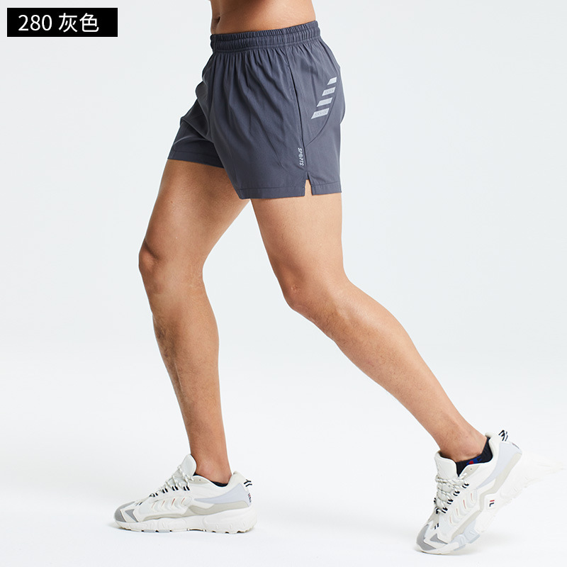 Verano maratón profesional de los hombres corriendo entrenamiento pantalones cortos deportivos de una sola capa de fitness ligero de secado rápido tres pantalones en stock