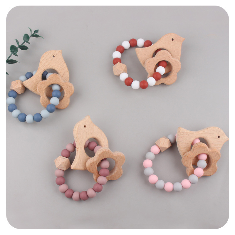 Nuevo bebé dibujos animados pájaros pulsera de madera de haya juguetes creativos pulsera de dientes de silicona pulsera de dientes