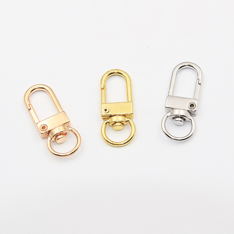 In stock zinc alloy rotating jewelry diy small door buckle color metal plating spring 3 points door buckle type keychain In stock zinc alloy rotating jewelry diy small door buckle color metal plating spring 3 points door buckle type keychain
