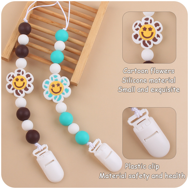 Nuevo bebé suministros de dibujos animados flor mordedor creativo bebé lindo silicona mordedura chupete cadena anti-gota cadena