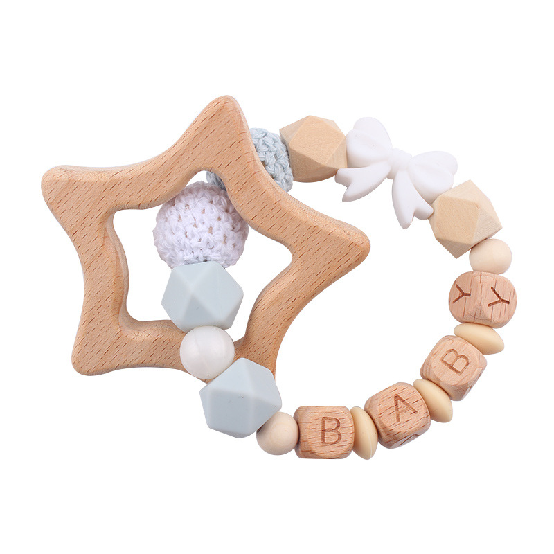 Nuevos productos para bebés abrazaderas de abrazaderas de haz de dibujos animados DIY pulsera de dientes molares decoración colgante de campana cuatro piezas