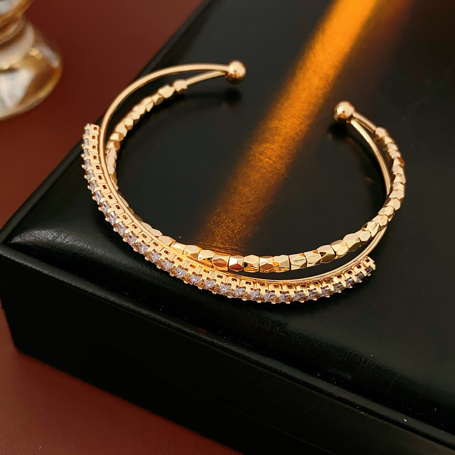 Pulsera de apertura cruzada de circón de color, pulsera exquisita de estilo de palacio de lujo ligero, joyería de moda de alta gama de todo fósforo al por mayor