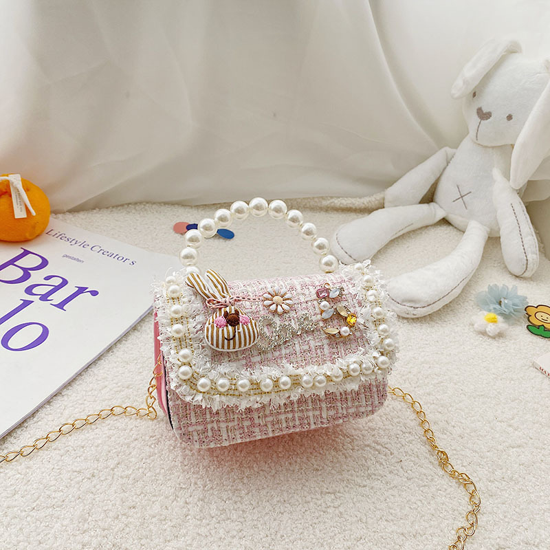 Bolso al por mayor para niños 2021 nuevo Xiaoxiang arco perla bolso de mano estilo occidental niña princesa cadena bolsa de mensajero