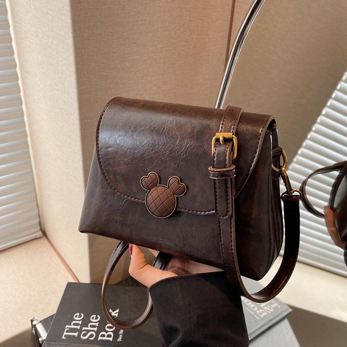 Este año, la popularidad de bolsos retrógrados para mujeres 2024 otoño y invierno nuevo bolso cuadrado de textura superior, bolso de mochila simple