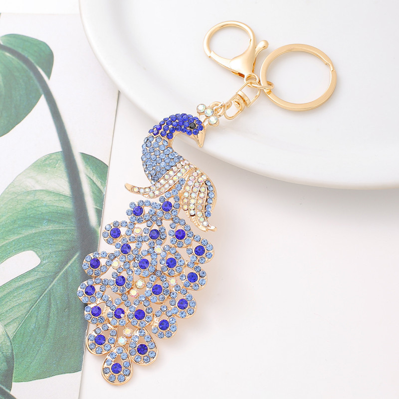 Creative fashion exquisite rhinestone peacock key chain new car key pendant Yiwu small commodity manufacturers wholesale