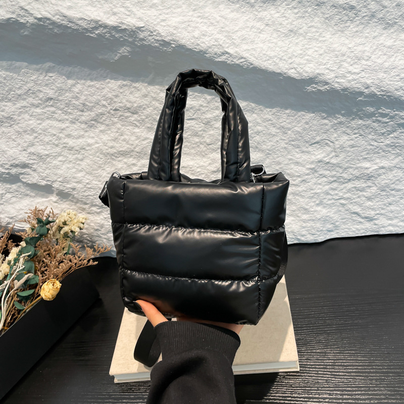 2024 nuevo bolso de mujer bolso de cubo otoño invierno simple abrigo de plumón ligero casual de moda versátil bolso de mano