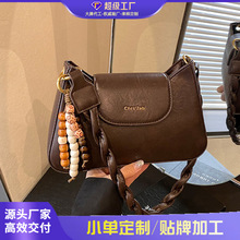 跨境2026春季新款磨砂高级感小众包包女复古斜挎包单肩腋下小方包