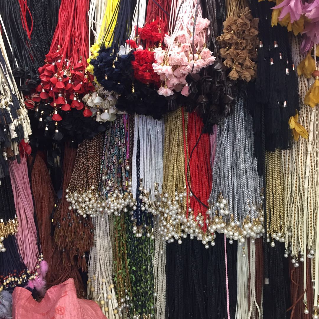 厂家直供饰品腰带珍珠吊饰皮条编织腰绳各种皮条编织饰品加工