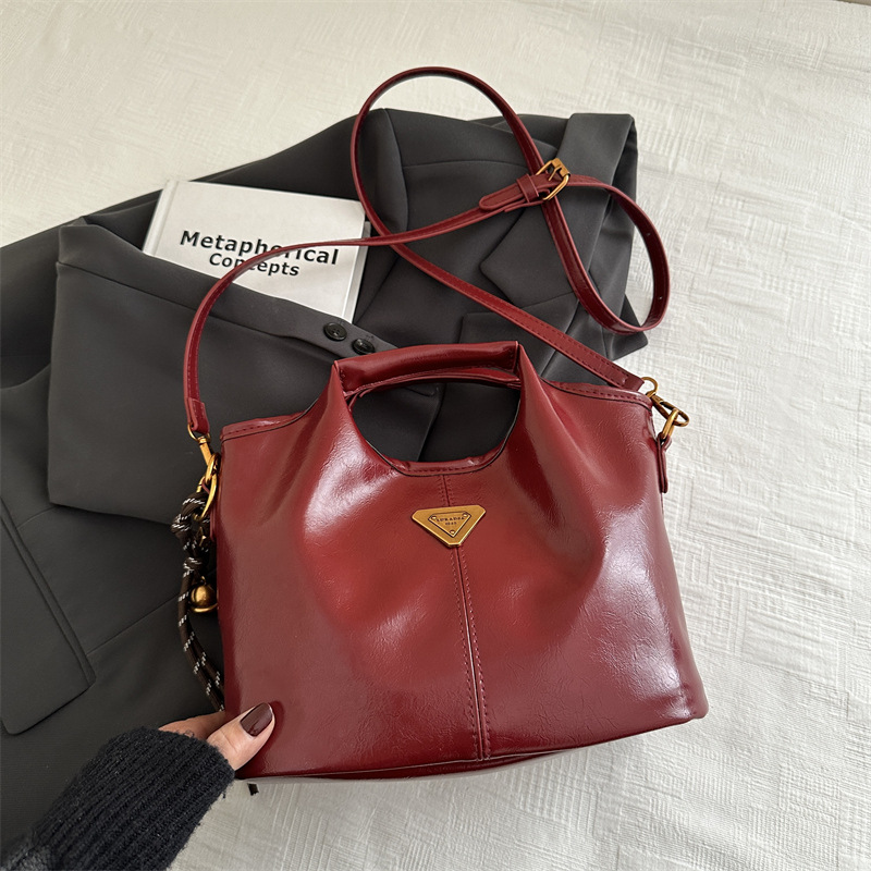 2024 alto valor retrógrado estilo de negocios Meillard bolso de cubo de mano de viaje versátil de invierno nuevo bolso de hombro