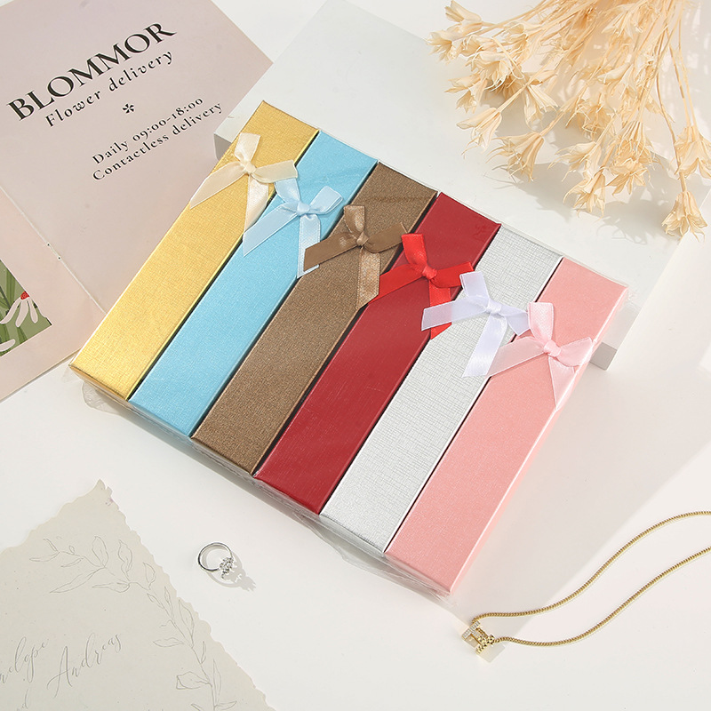 Moderno sistema minimalista de arco de color sólido caja pequeña caja de regalo de vacaciones caja de joyería hermosa caja de color mezcla al por mayor