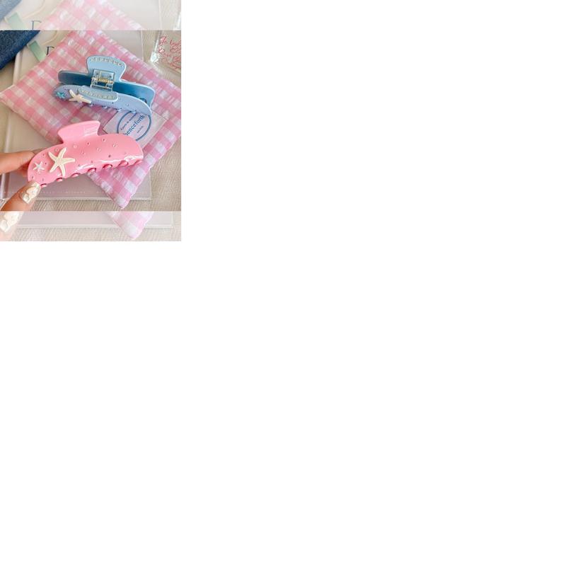 和粉红色发夹的女性头发在甜蜜的鲨鱼夹假期发夹头发配件的后脑勺|undefined