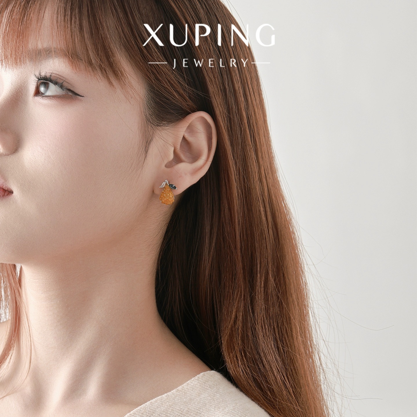 Xuping pequeño fresco lindo estilo de frutas pernos nicho japonés y coreano color Bao serie transparente pera otoño invierno orejas