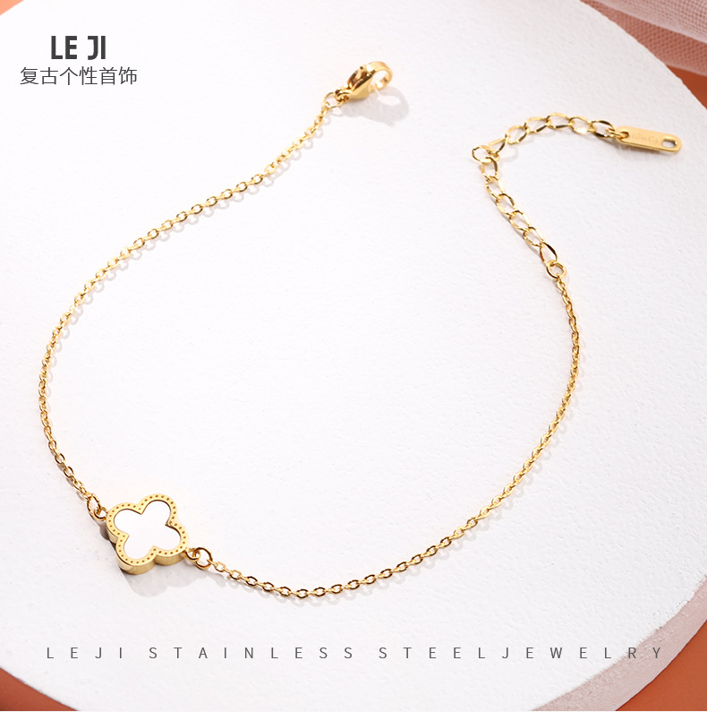 JL-0148: blanco joven trébol elegante oro