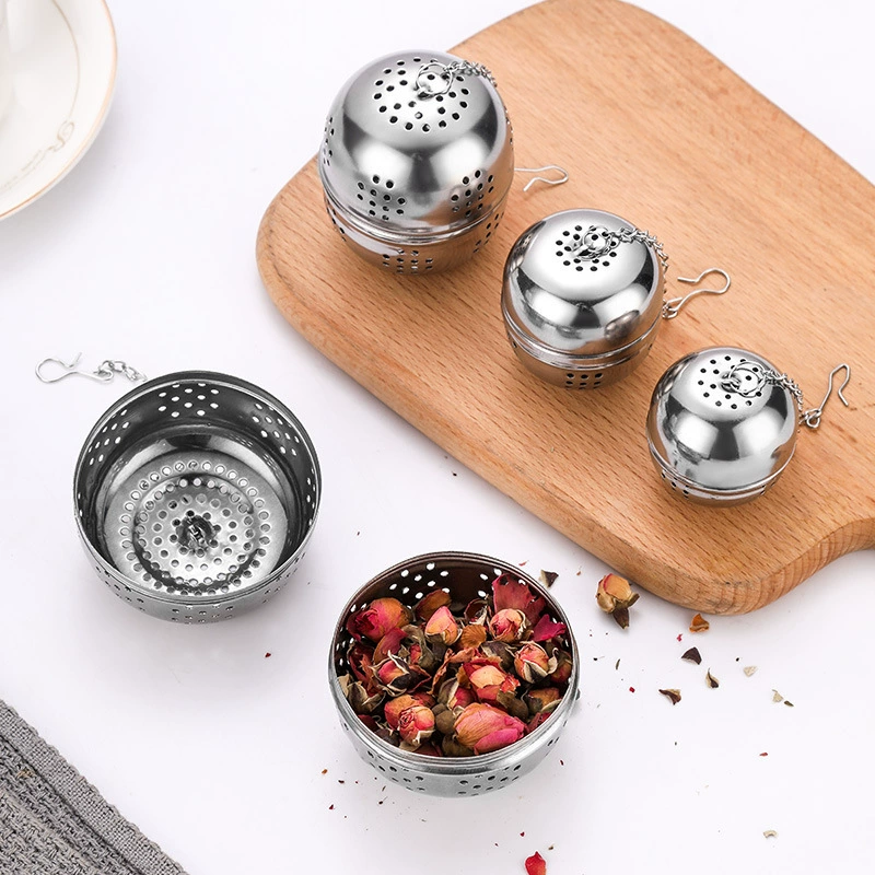 A piece of stainless steel tea ball makeup tea 味 宝 一 一 一 一 料 ingredients kitchen gadget chimin