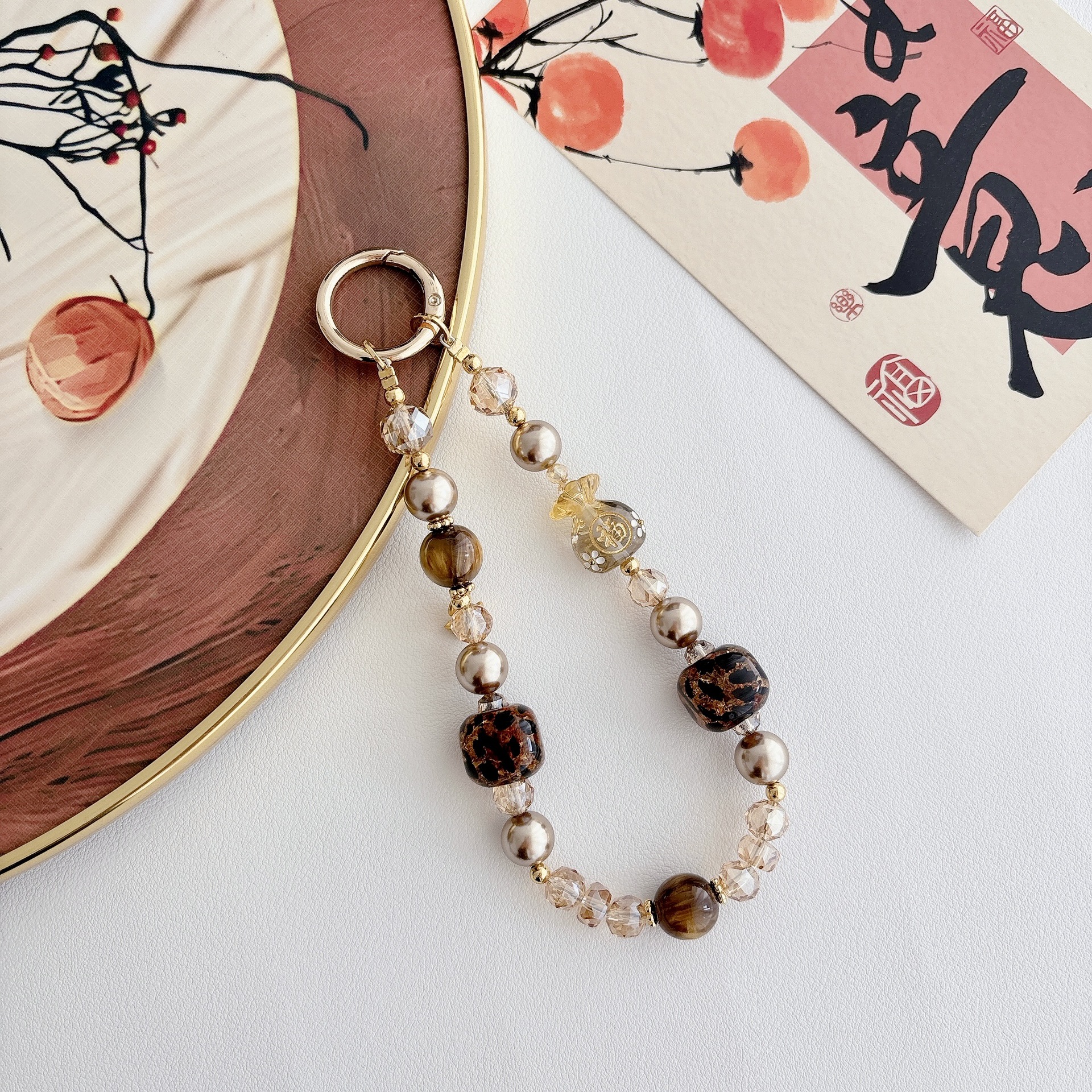 La sensación de alto nivel de lujo ligero bolso Fuyuan Bao cadena de teléfono móvil cadena de teléfono móvil bolso llavero colgante nicho diseño