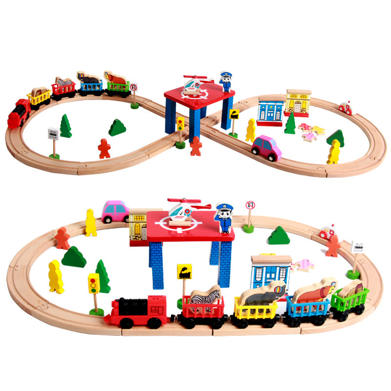 Nuevo estilo 100 piezas de lujo de madera juego de riel eléctrico serie tren riel niños juguetes de montaje de bricolaje al por mayor
