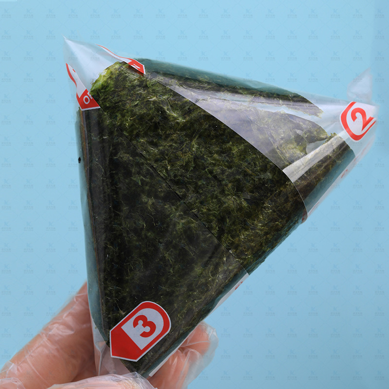 Fábrica directa de doble capa de bolsas de arroz triangular se puede calentar fácilmente desgarrar la bolsa de embalaje de sushi desechable de calidad de alimentos