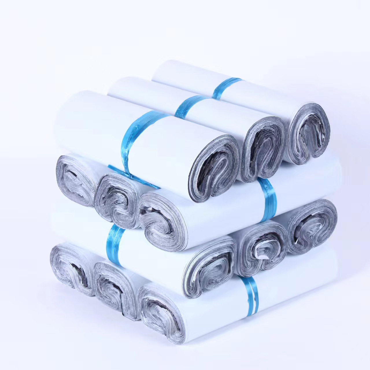 Xiaowei nuevo material blanco expreso bolsa 12 bolsa de embalaje de seda engrosada impermeable antifouling expreso bolsa de embalaje al por mayor