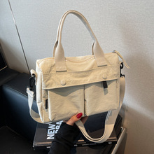 尼龙布包2025春夏新款通勤女士单肩包女小清新文艺纯色手提斜跨包