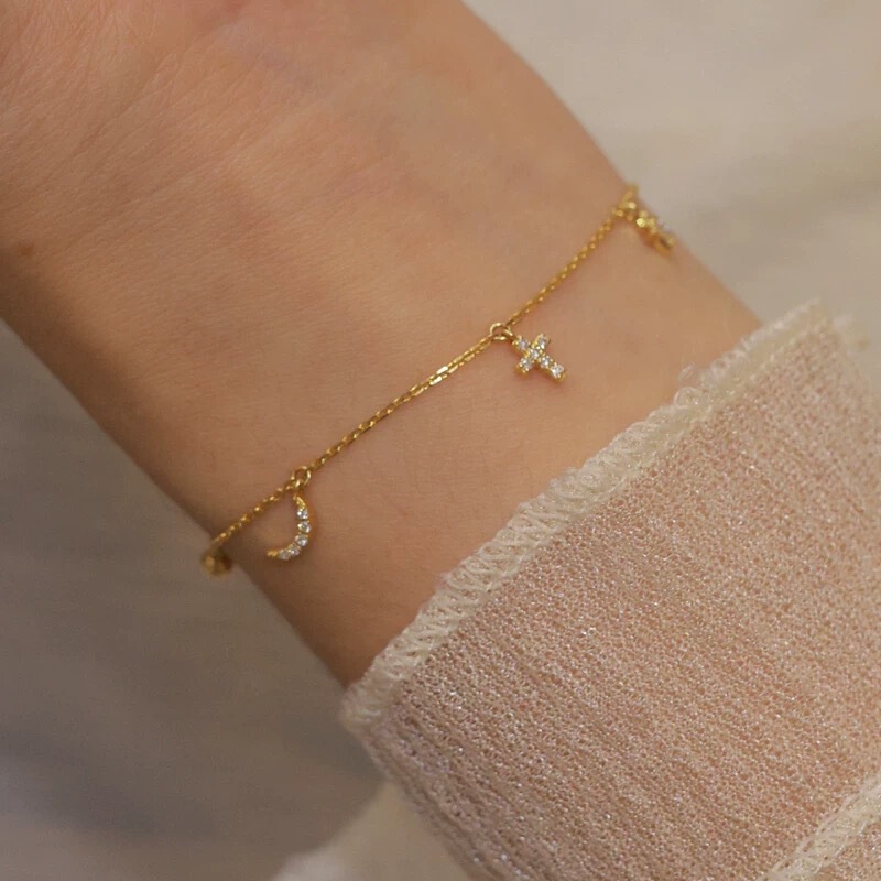 Source manufacturers S925 sterling silver plated 14K gold star moon cross bracelet female niche high-end jewelry wholesale