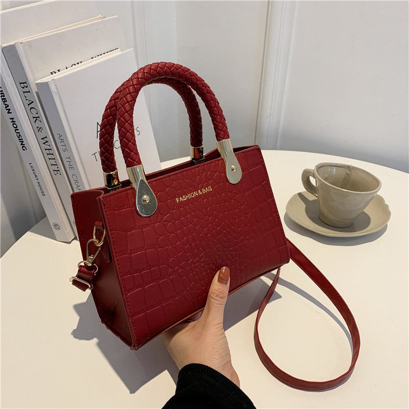 Bolsa de moda con textura para mujer 2024 estilo coreano estilo occidental nuevo color caramelo patrón de piedra bolso tejido bolsa de mensajero