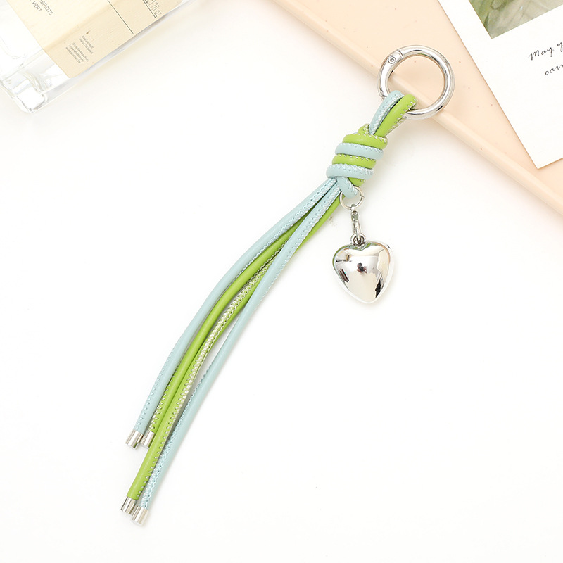 Nuevo tipo de cuerdas de cuero PU llavero colgante in bolsos de moda colgante cadena accesorios DIY tejido a mano