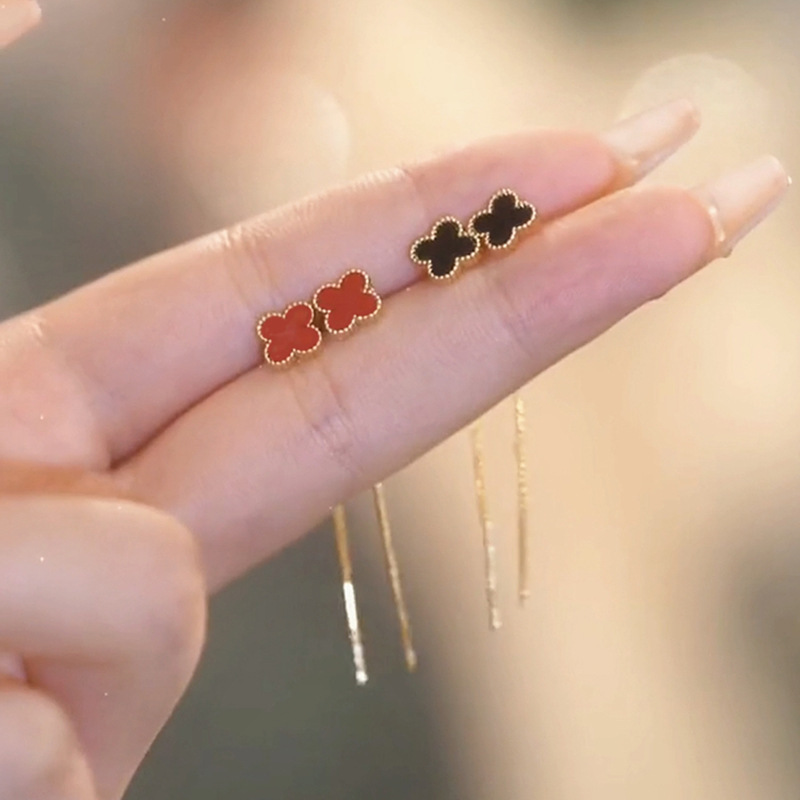 Trébol de cuatro hojas, pendientes exquisitos de alta gama, borlas femeninas, cadena larga simple y de moda de todo fósforo, pendientes de aguja plateada S925 para mujeres