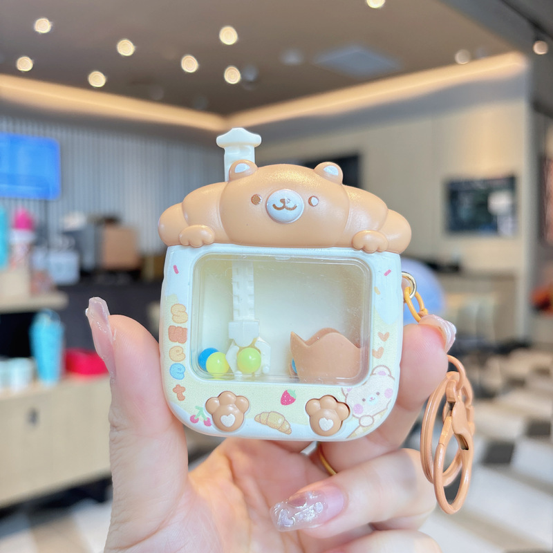 クリエイティブで興味深いボールキャッチマシンキーホルダー小型家庭用人形マシン子供のおもちゃ小さなクリップ人形マシン小さなペンダント|undefined