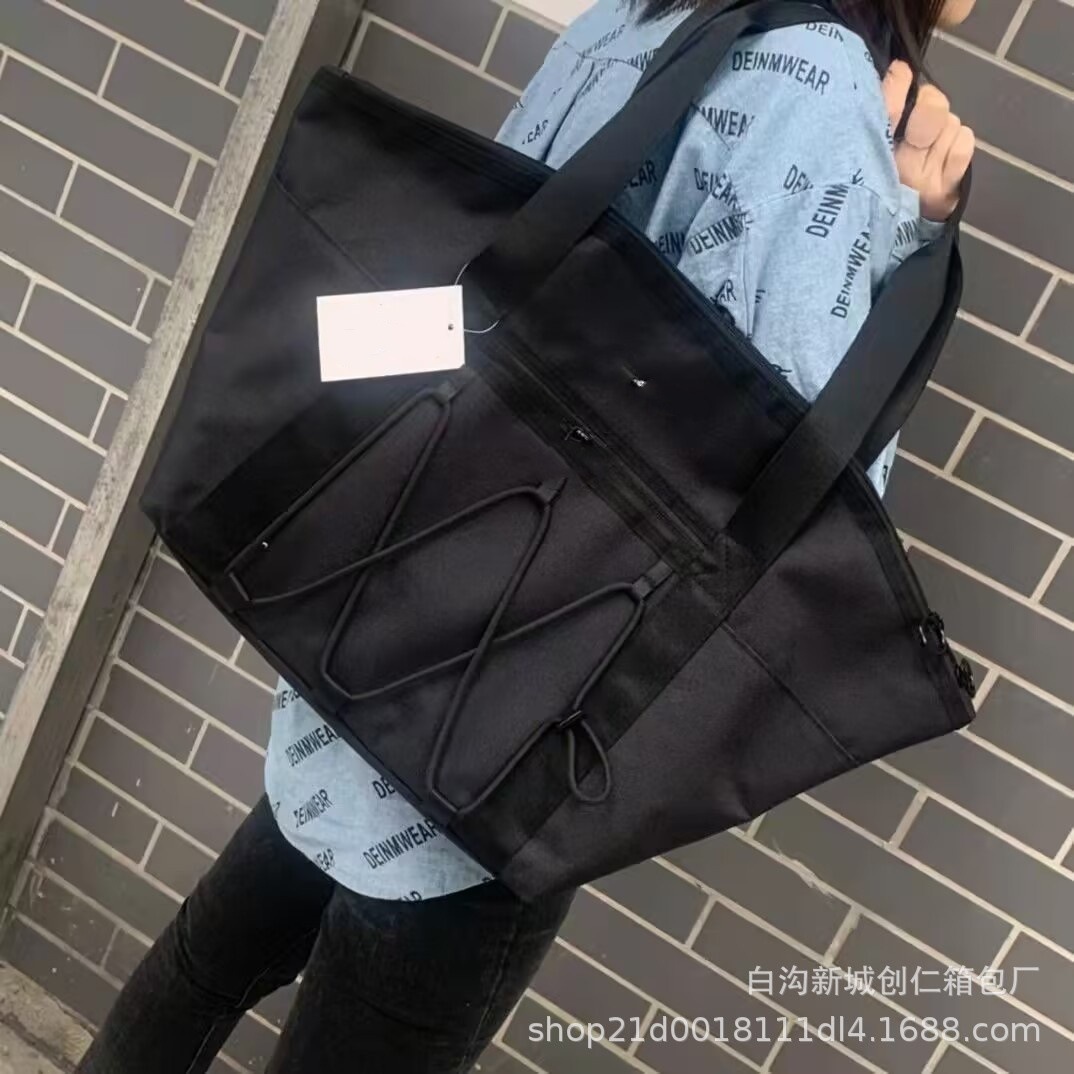 패셔너블한 단거리 휴대용 대용량 여행 가방 건습 분리 스포츠 피트니스 가방 대외 무역 도매 여행 가방 여성용