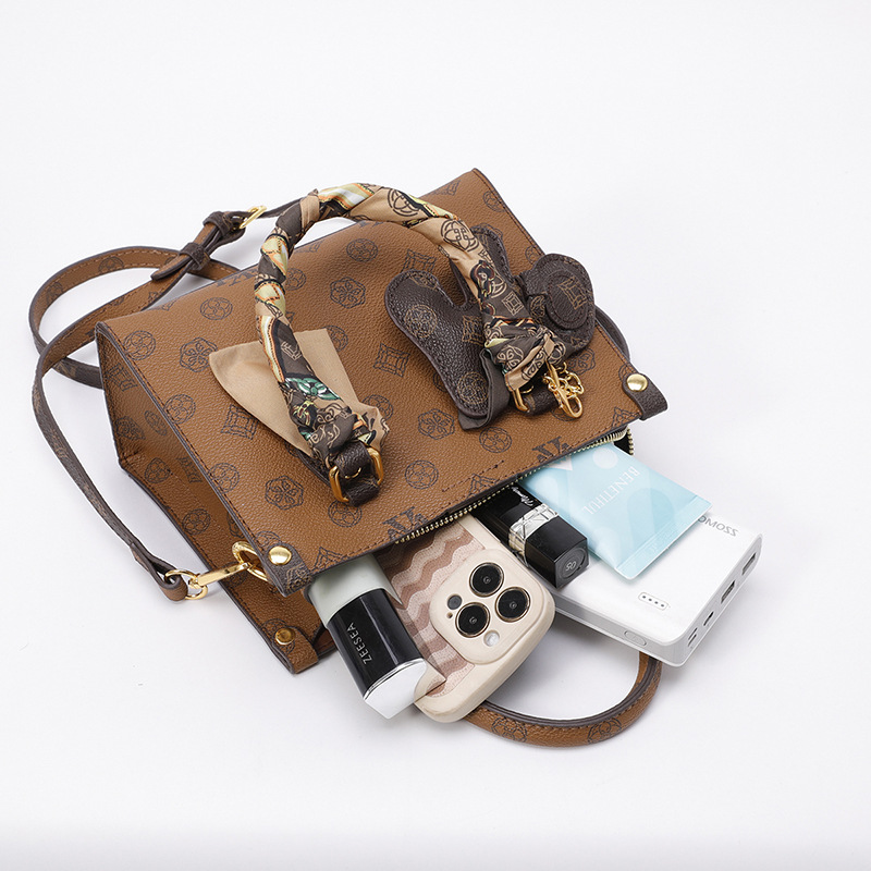 Bolso de impresión retro 2024 invierno nuevo bolso de tendencia temperamento de moda versátil hombro alto sentido ligero bolso de lujo de mujer