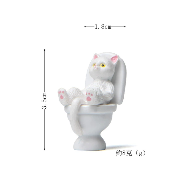 Lying posture: white cat in the toilet