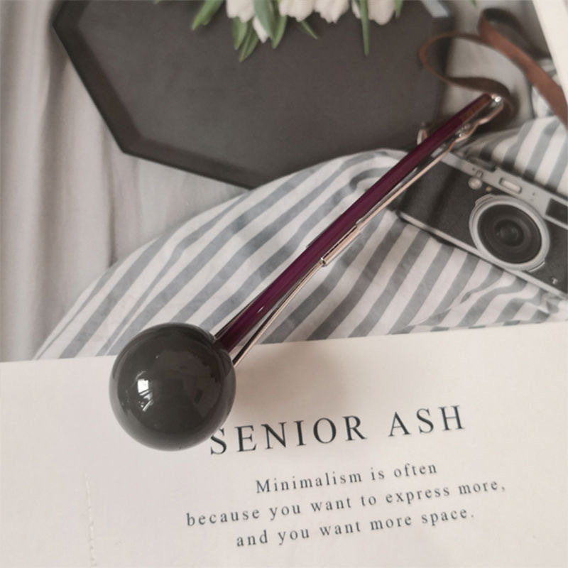 회색과 보라색 롤리팝 머리핀