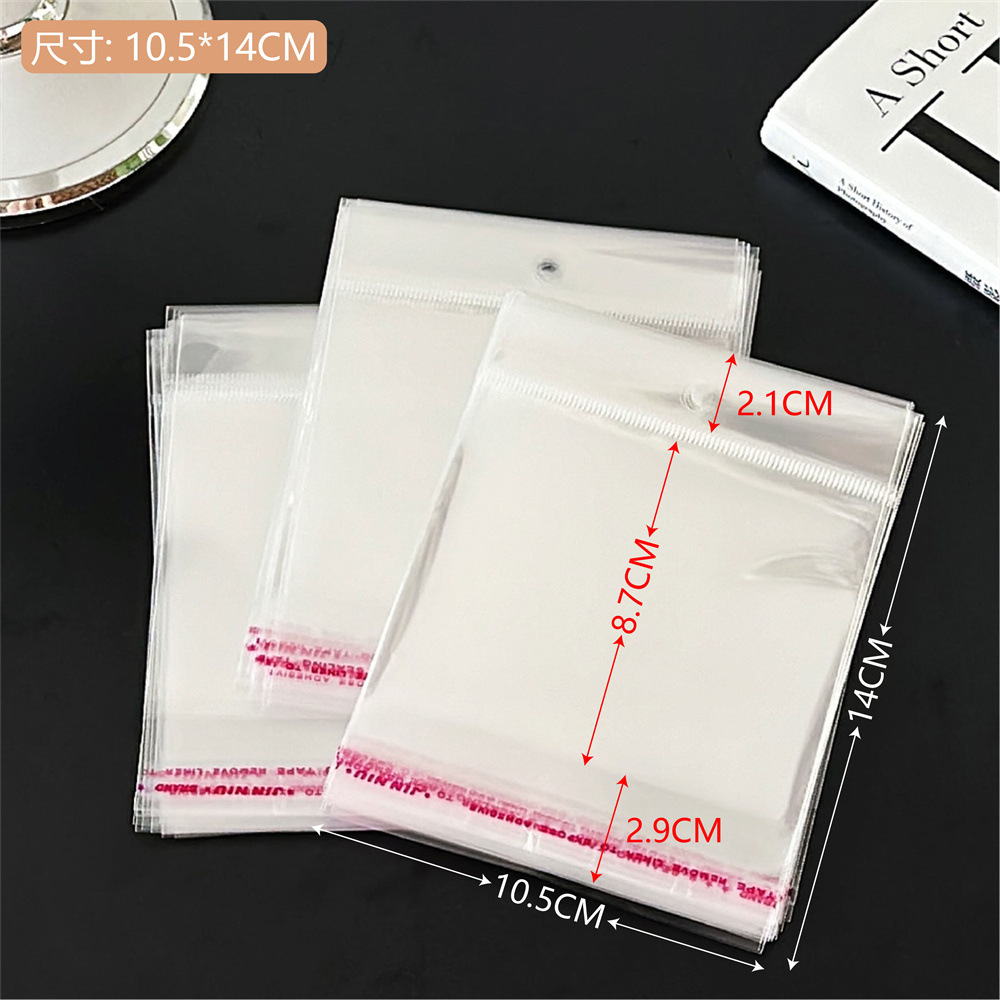 Colección de bolsas opp transparentes, cabeza de tarjeta, bolsa de embalaje trasera, bolsa de joyería pequeña, bolsa autoadhesiva con orificio colgante, bolsa de embalaje de plástico al por mayor