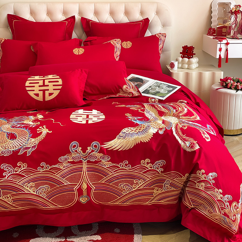 Una clase de madres y bebés de algodón de boda cuatro piezas grandes sábanas bordadas rojas chinas cubierta de cama de boda