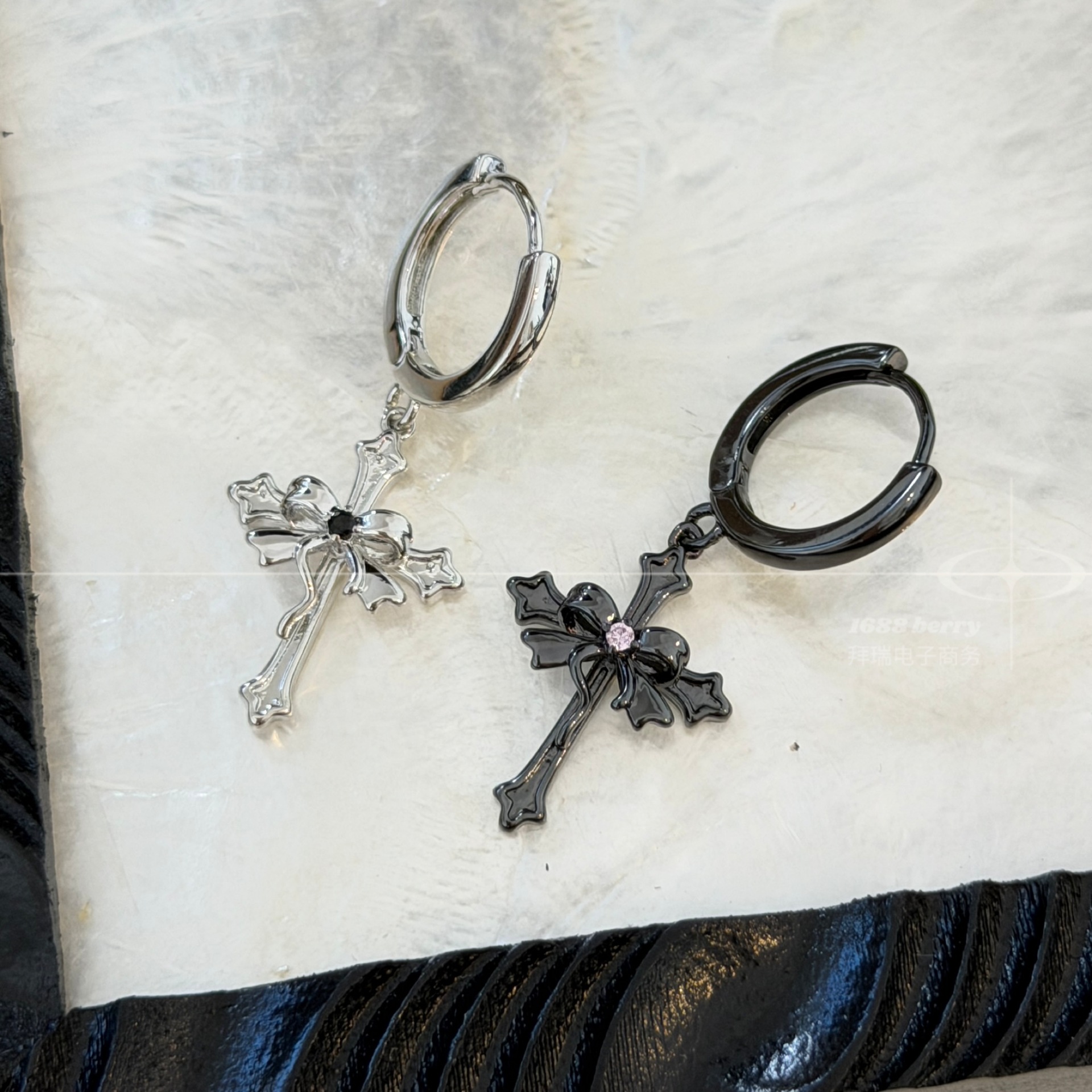Sweet and girly bow and cross earrings, black and pink color scheme, dark and cool, with a unique and stylish design