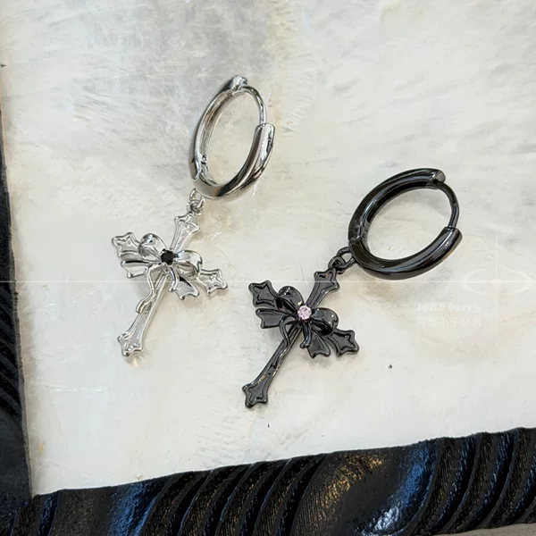 Sweet and girly bow and cross earrings, black and pink color scheme, dark and cool, with a unique and stylish design