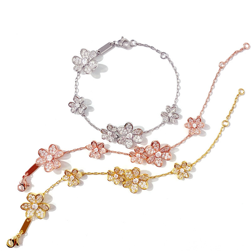 AliExpress foreign trade source Korean INS light luxury temperament design feeling full of diamond size flower clover flower bracelet