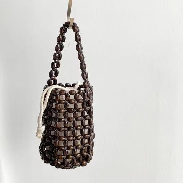 New Retro Wooden Bead Bag European and American Portable Bucket Bag Hand-Woven Niche Design Literary Handmade Women's Bag New Retro Wooden Bead Bag European and American Portable Bucket Bag Hand-Woven Niche Design Literary Handmade Women's Bag
