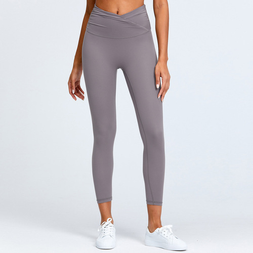 Yoga pants, fitness nude feel, light weight, European and American high-end high-waisted butt-lifting peach-butt sports running tights for women