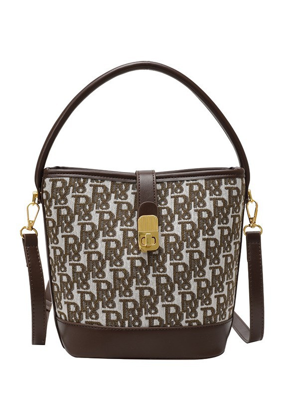 Bolso de mano exquisito de alta gama para mujer 2025 nuevo bolso de cubo retro con estampado de tela bolsa de mensajero de un solo hombro de nicho