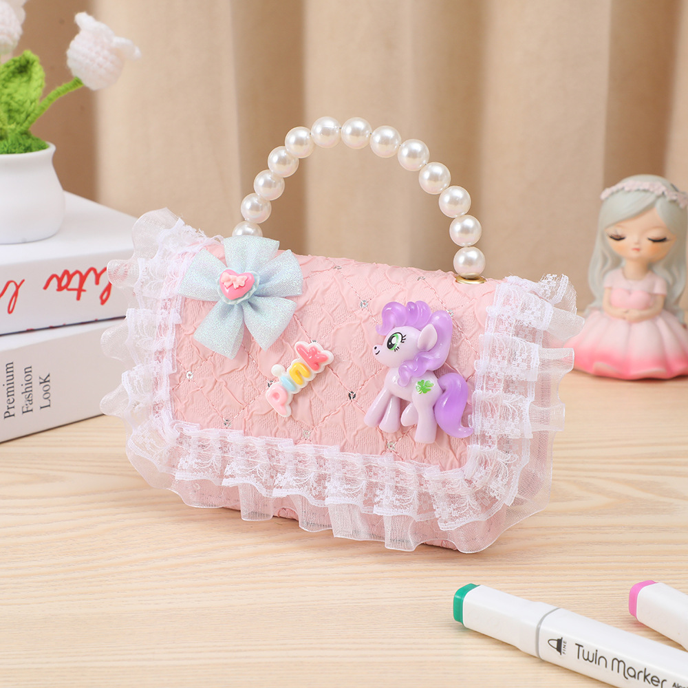 Cute divertido bolso para niños pequeño Xiangfeng perla monedero portátil pequeña princesa bolsa de almacenamiento bandolera estilo ins al por mayor
