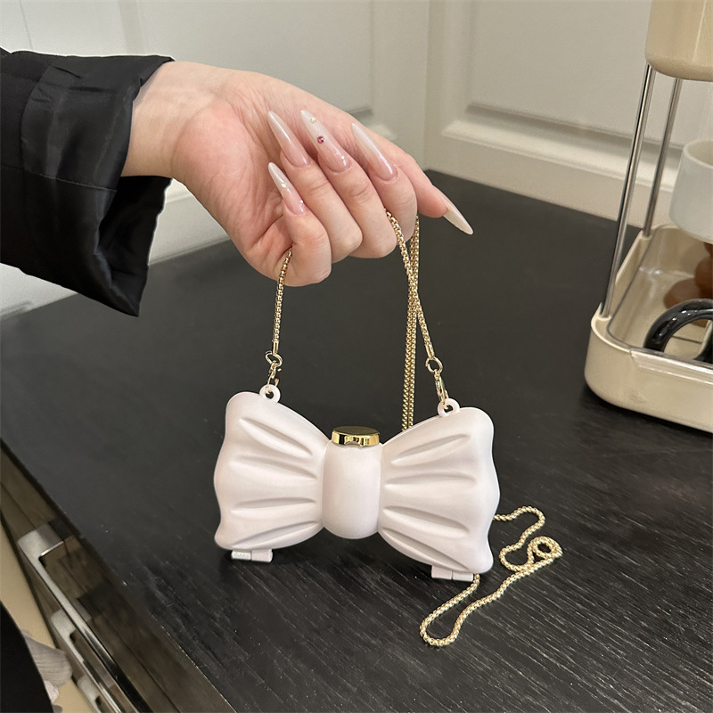 个性金属蝴蝶结小包包2025新款时尚珍珠链条斜挎包女士迷你口红包