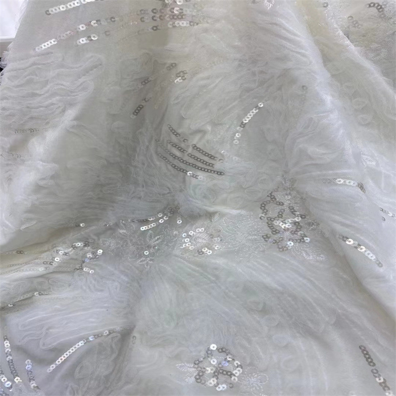 新品亮片网布绣花面料婚纱连衣裙礼服面料现货供应优雅礼服布花边