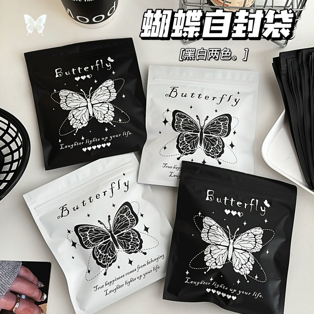 Bolsa de alto valor negro y blanco mariposa auto-sellada, pequeña bolsa de regalo, bolsa de embalaje de regalo, bolsa de sellado de viento, pequeña bolsa ciega