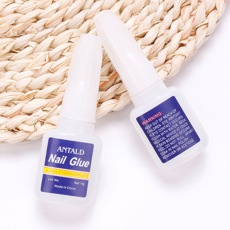 Cross-border supplies nail glue wholesale 10g blue bottle with brush head nail glue quick-drying sticky strong adhesive drill glue Cross-border supplies nail glue wholesale 10g blue bottle with brush head nail glue quick-drying sticky strong adhesive drill glue